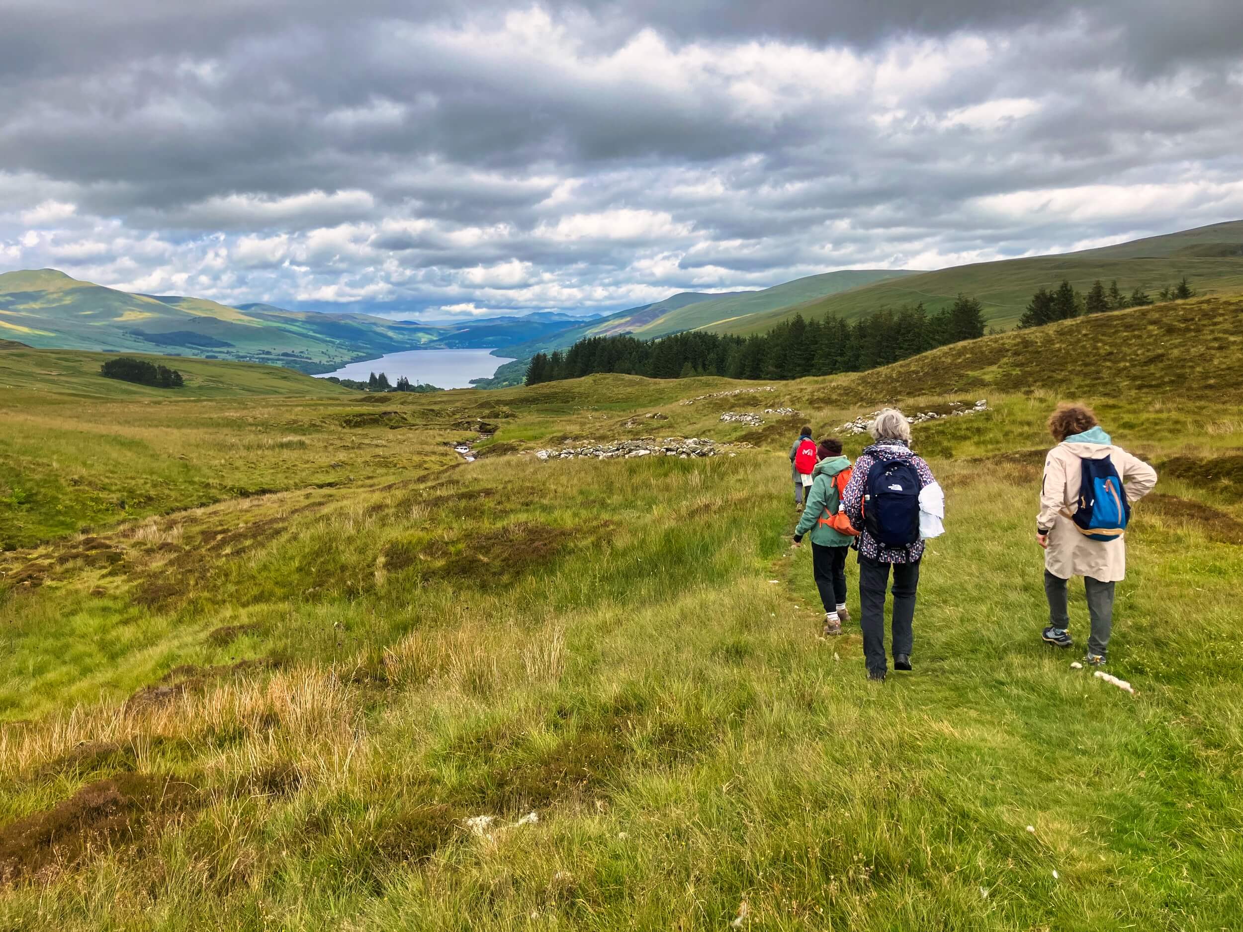 rrw hikers on path down to loch