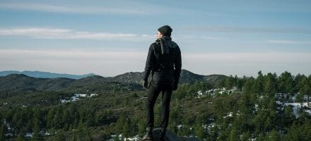 Man Standing on A Mountain