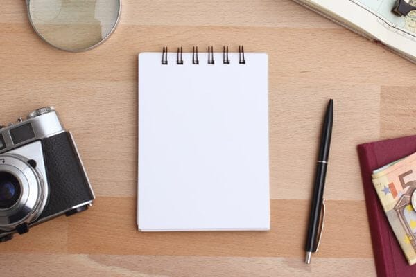 A notepad to write your hiking checklist on