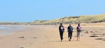 Walking along a beach on a self-guided walk on the Dingle Way - Hillwalk Tours