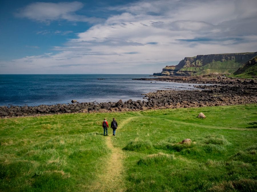 two girls travel to giants causeway in northern ireland