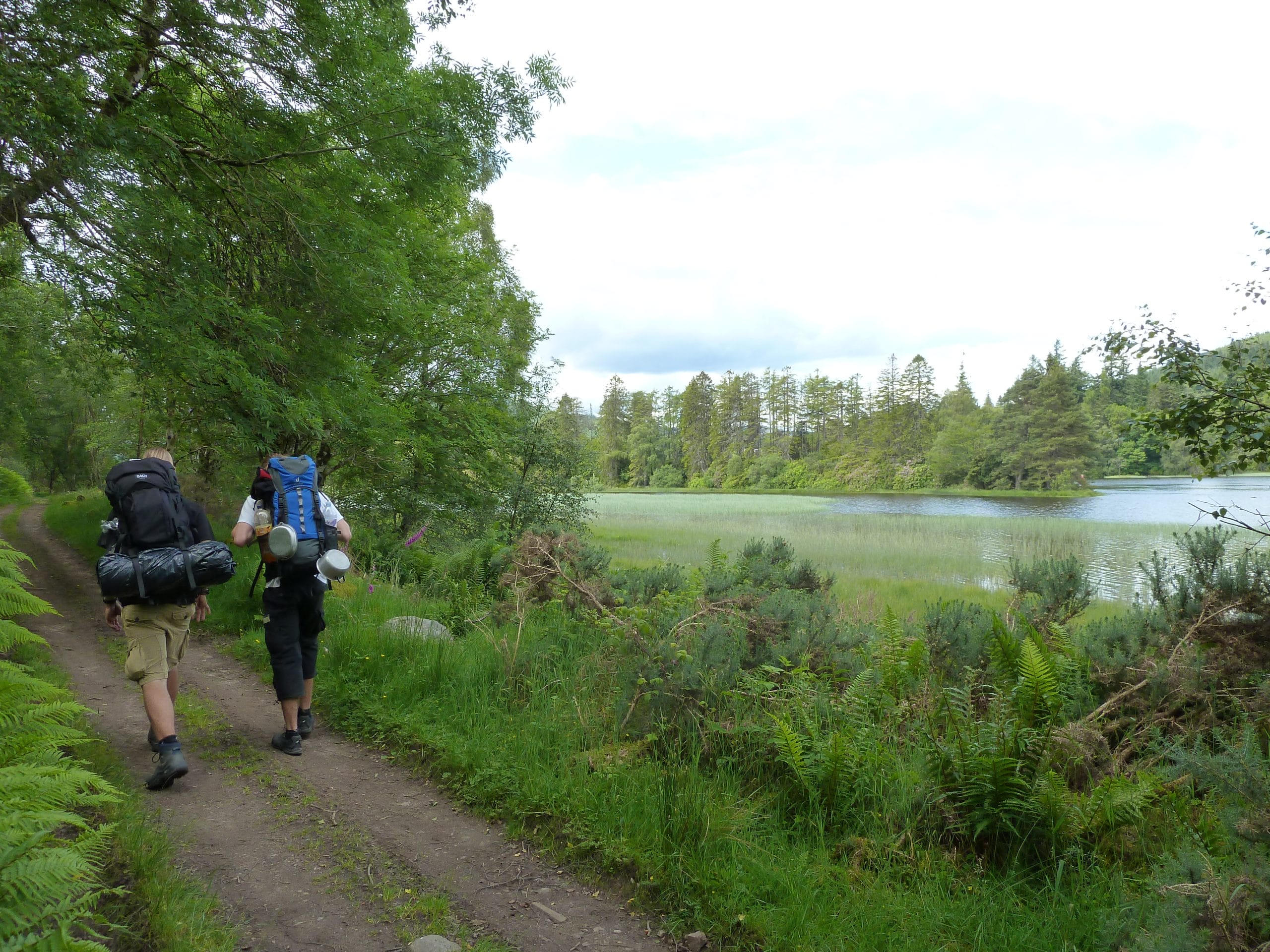 walkers next to loch oichy