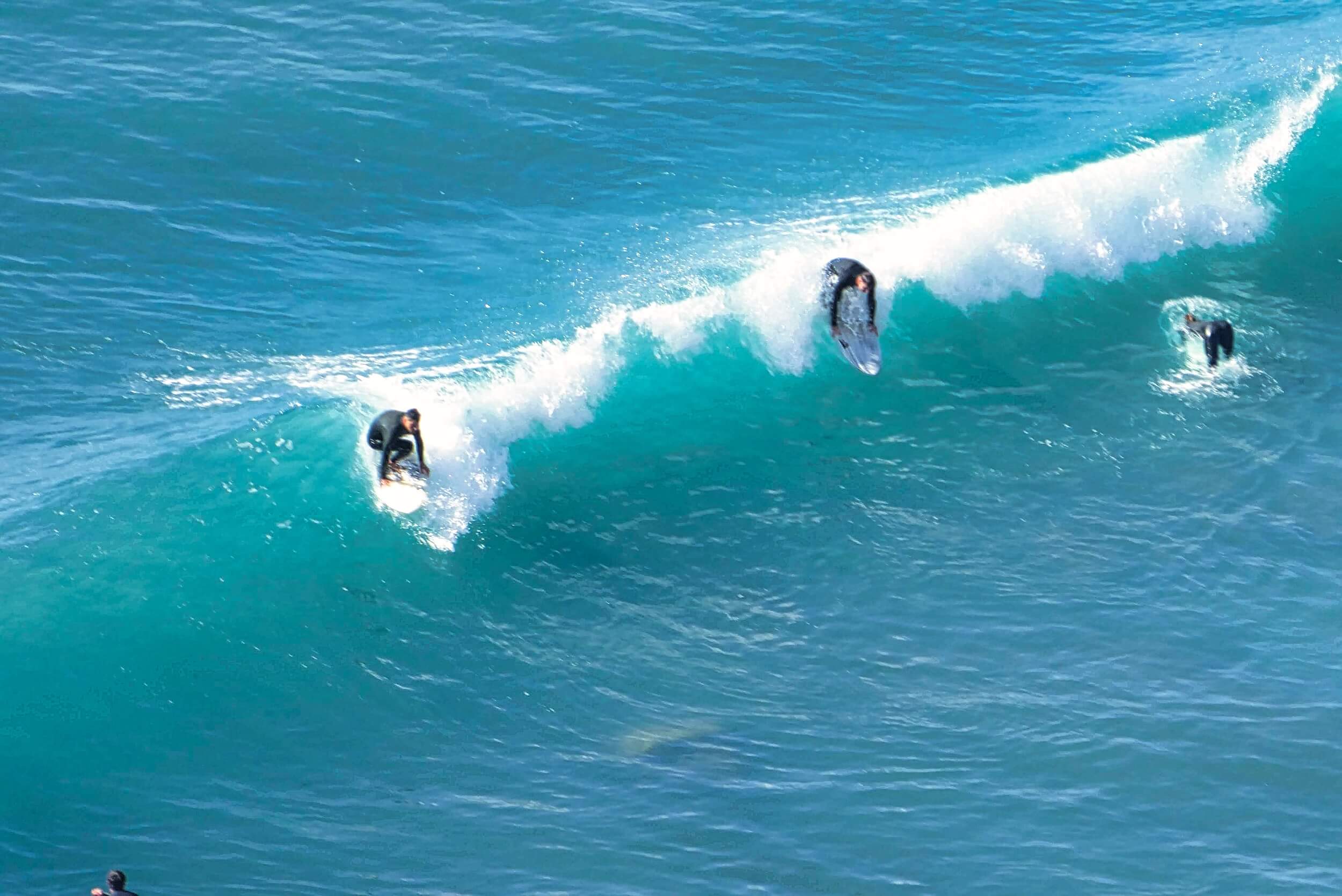 salema praia da luz surfers catching waves rtpd 1090476