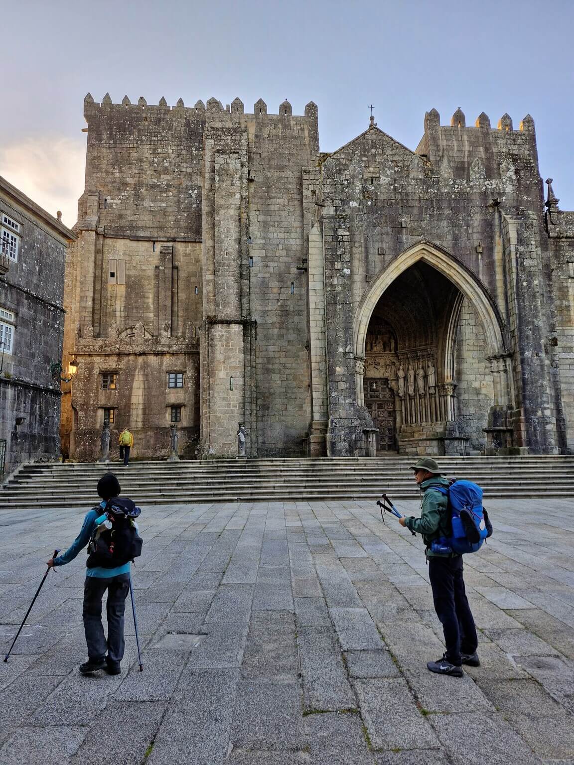 Walkers in front of Tui Cathedral in the morning